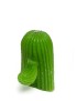 Close-up of a Green saguaro cactus-shaped pillar candle with visible wick.