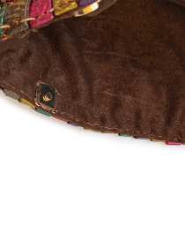 Interior view showing soft brown linen lining and magnetic clasp.