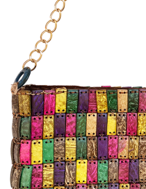 Side profile of wooden bag showing tile texture and wirework.