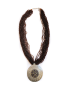 Multi-strand amber brown beaded necklace with silver pendant.