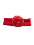 Flat lay of red infant hair band with rhinestone lace flower.