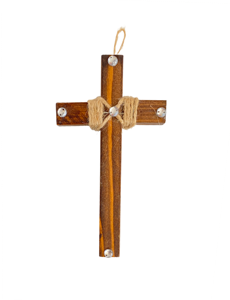 Handcrafted dark wood cross with twine wrap and silver studs on white background.