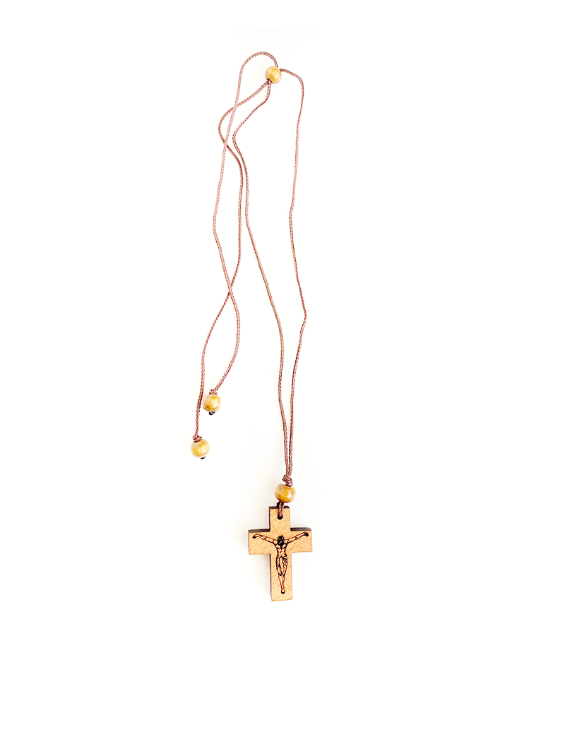 Full view of wooden crucifix necklace with adjustable cord.