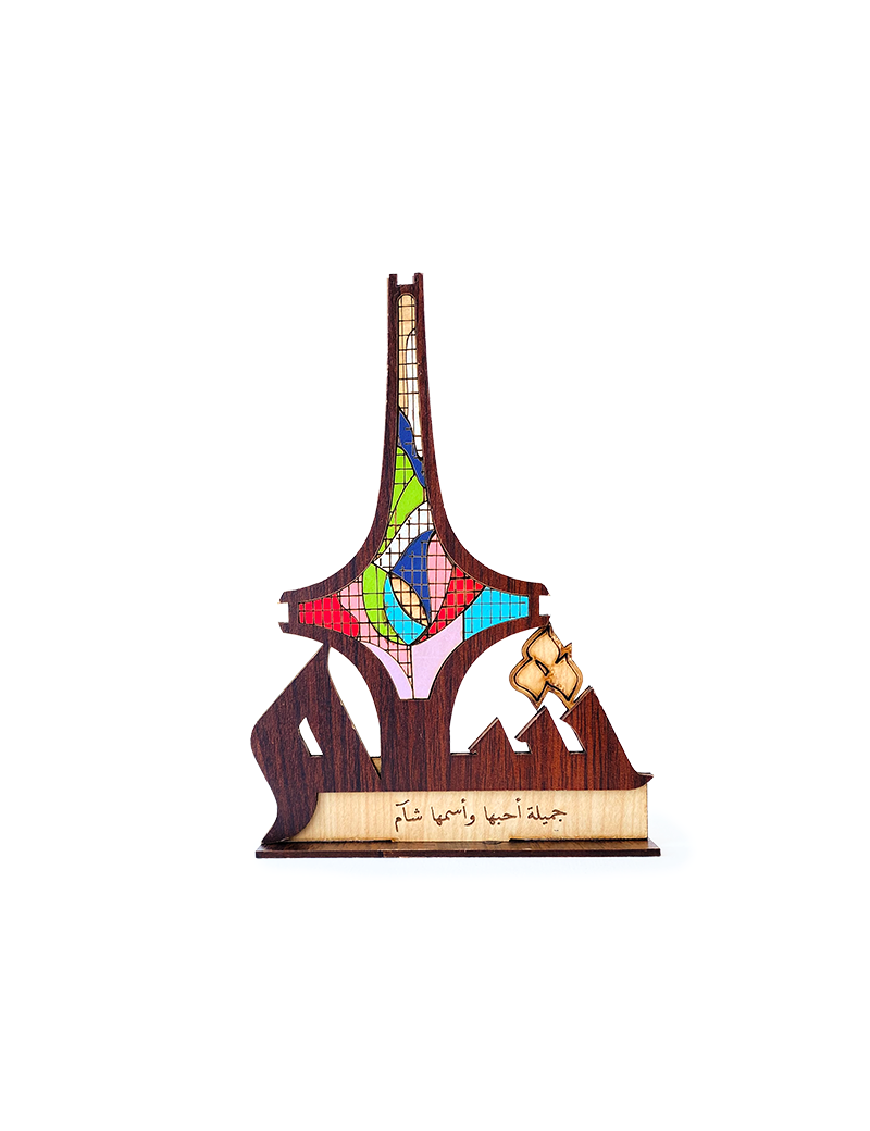 Front view of wooden Damascus Sword monument with colorful inlay.