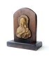Side profile of carved Madonna and Child relief on wood