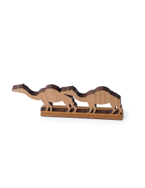 Profile view of three camels laser-cut from light brown wood.