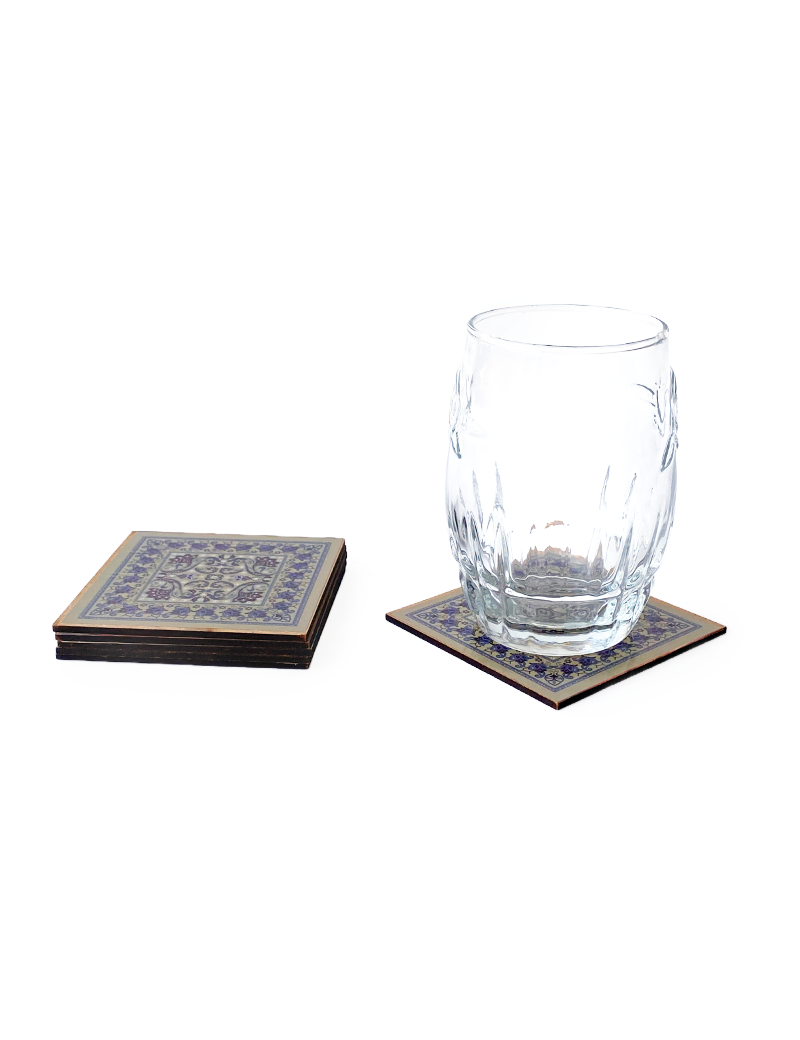 Oriental wooden coaster in use with a clear water glass.