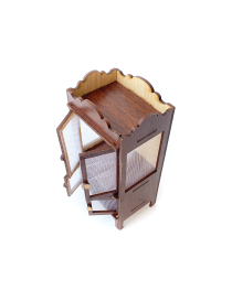 Miniature wooden Namleih pantry with open mesh doors.