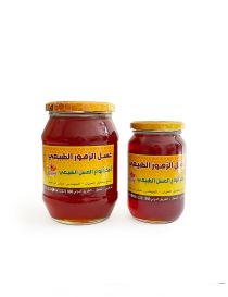 Comparison of large and small jars of black seed honey.