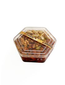 Hexagonal gift box of Syrian honey and mixed nuts.