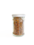 Glass jar filled with multi-colored bee pollen granules