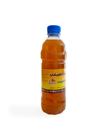 Front view of Al-Zahour natural honey vinegar in a clear bottle.
