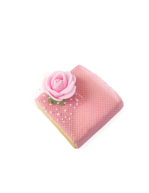 Premium chocolate wrapped in pink mesh with a handcrafted rose decoration for gift delivery in Syria.
