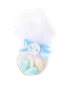 Handmade baby shower favor bag with blue candies and satin ribbon for delivery in Syria.