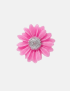 Colorful handcrafted floral candles on stems with glitter centers by Tabark Designs.