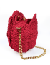Side view of the crimson red Damask Rose crochet bag with gold chain strap and magnetic snaps, handmade in Syria.