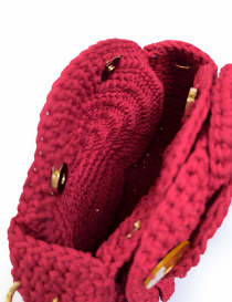 Interior view showing the lining and double magnetic snap closures of the handmade Syrian evening crochet purse.