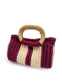 Front view of a handmade burgundy and beige macrame handbag with a circular woven bamboo handle