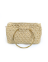 Front view of handcrafted beige crochet clutch bag featuring a round gold metal handle.