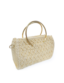Angled side view of structured luxury crochet bag with twin gold circular handles.