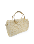 Angled side view of structured luxury crochet bag with twin gold circular handles.