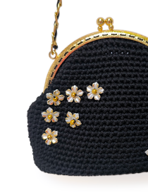 Classic vintage gold-toned kiss lock clasp on hand-knitted Damascene purse