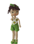 Close up of Sarah crochet doll with gentle smile and curly hair band