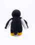 Back view of handcrafted penguin crochet soft toy for newborns in Syria