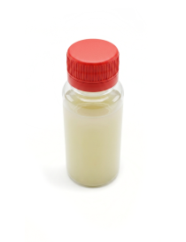 Front top view studio photograph of Kanz AlTabia pure natural coconut oil bottle on white background.