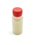 Front top view studio photograph of Kanz AlTabia pure natural coconut oil bottle on white background.