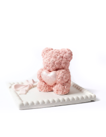 Handmade gypsum rose bear with heart on decorative base for Syria gifting.