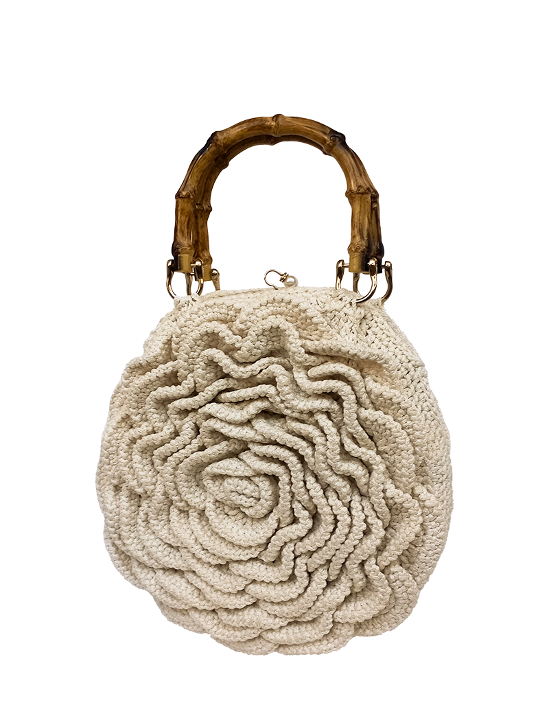 Off-white handmade crochet rose bag with bamboo style handles front view
