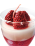 Side view showing red gel wax and white soy wax layers of strawberry cheesecake candle