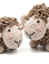 Detailed close-up shot of two plush crochet lamb toys, showcasing the soft velvet texture and child-safe eyes.