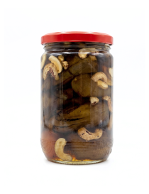Sealed jar of Qitaf eggplant jam packed with whole cashews