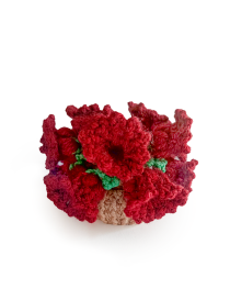 Folded handmade crochet red rose bouquet in a small basket, crafted in Syria.