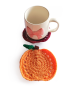 Handmade crochet pumpkin coaster with ceramic coffee mug