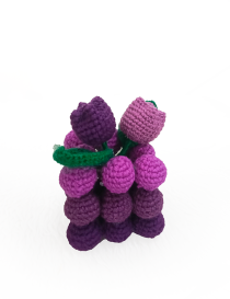 Handmade purple crochet bubble candle decorated with crochet tulips for gift delivery in Syria