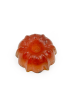 Top angle view of Ogaria natural turmeric and hibiscus glycerin soap in donut shape