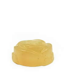 Side view profile of rose-carved transparent amber glycerin soap bar from Ogaria