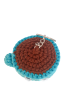 Top view of crochet coffee cup keychain showing metal key ring and brown coffee top