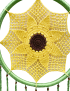 Detailed view of the intricate yellow crochet sunflower pattern and brown center.
