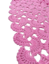 Scalloped edge detail of handmade pink crochet scarf.