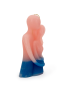 Three-quarter angle of the romantic couple candle highlighting the textured wax.
