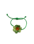 Adjustable green crochet flower bracelet with orange crystal center.