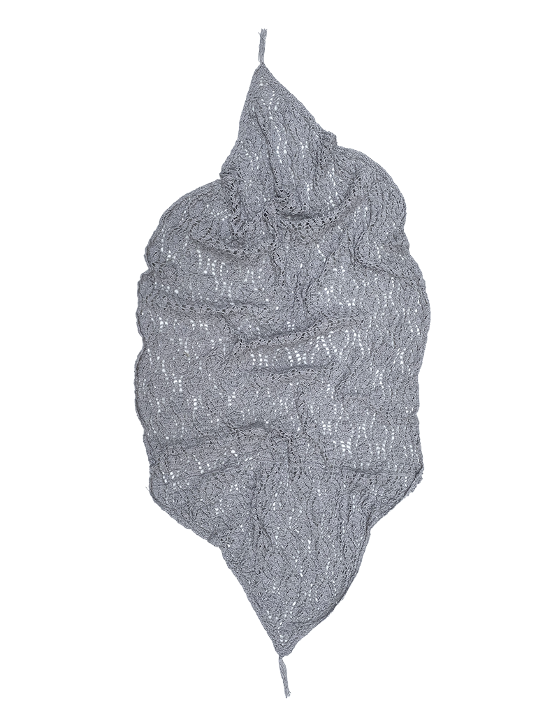 Folded texture of silver wool crochet lace table cover.