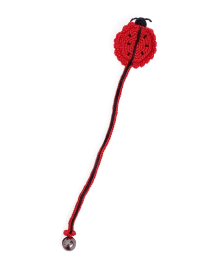 Full-length view of a handmade crochet ladybug bookmark with a weighted bead base.