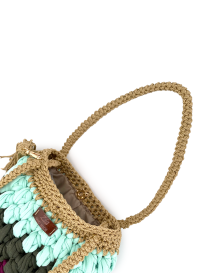 Open top view of the crochet bag showing the magnetic closure and interior lining.