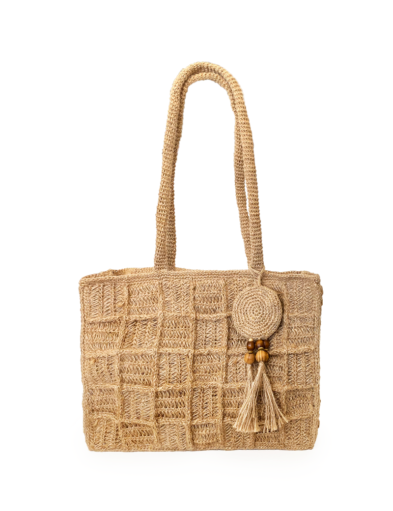 Front view of a square-patterned hand-crocheted jute tote bag with decorative wooden bead tassel.