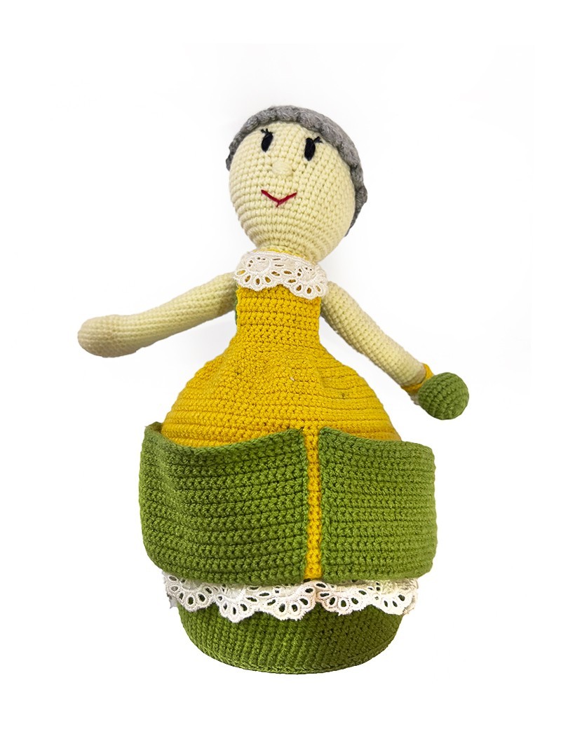 Handmade crochet doll with grey hair bun and lace collar.